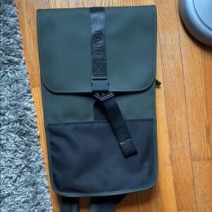 Rains Green and Black Backpack
